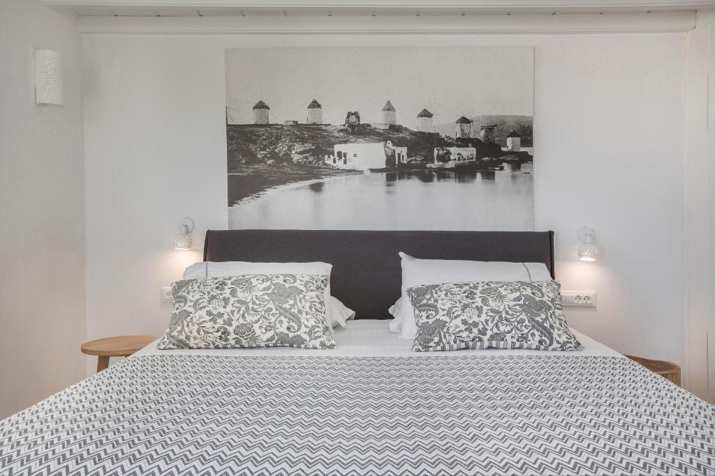 Postel nebo postele na pokoji v ubytování Kostantis Town Suites