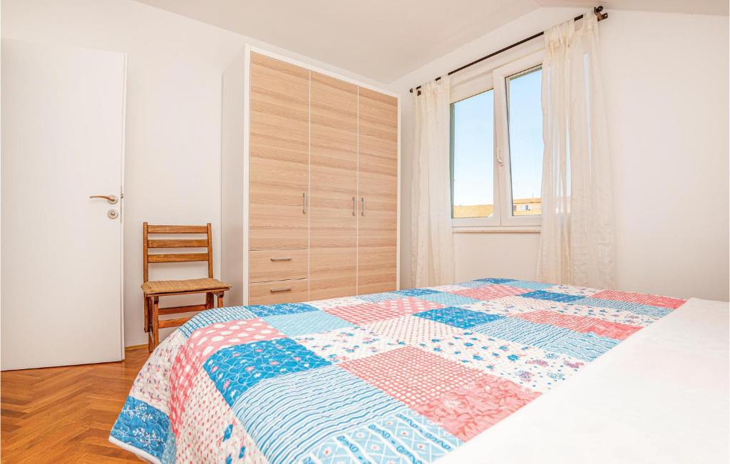 Posteľ alebo postele v izbe v ubytovaní Two-Bedroom Apartment Vodice With Sea View 06