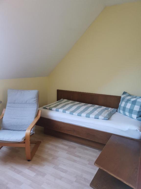 Postel nebo postele na pokoji v ubytování Pension Arkadenhof