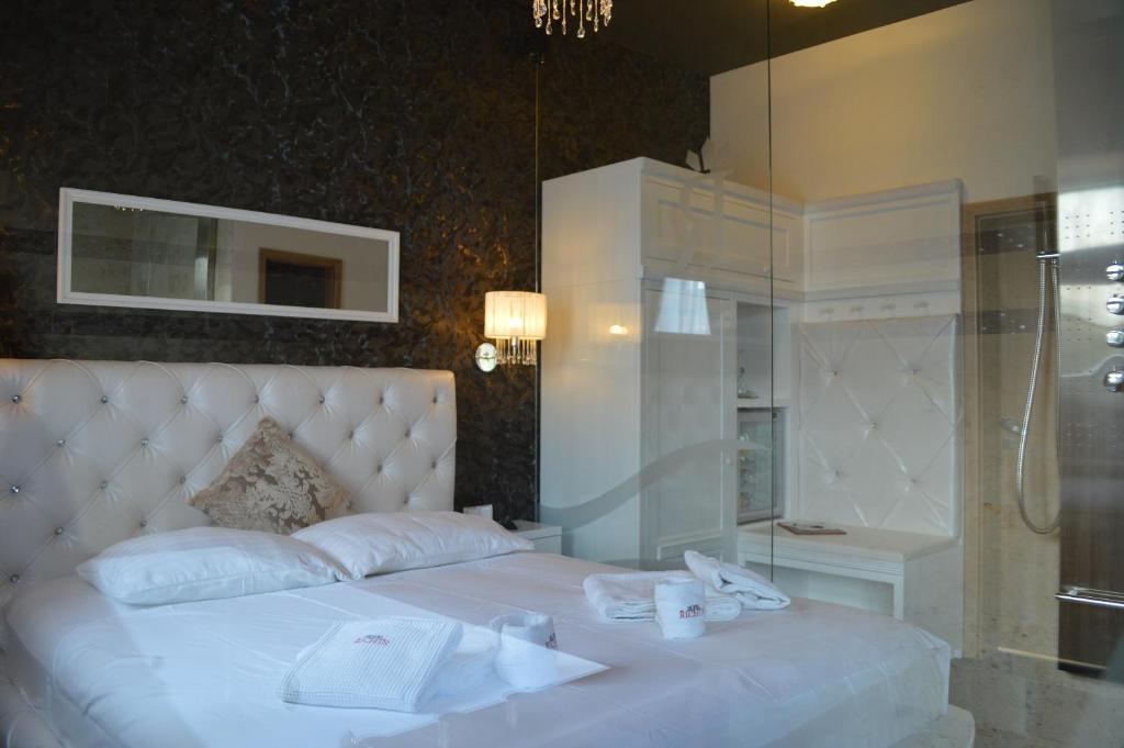 Postel nebo postele na pokoji v ubytování Hotel RICHTR