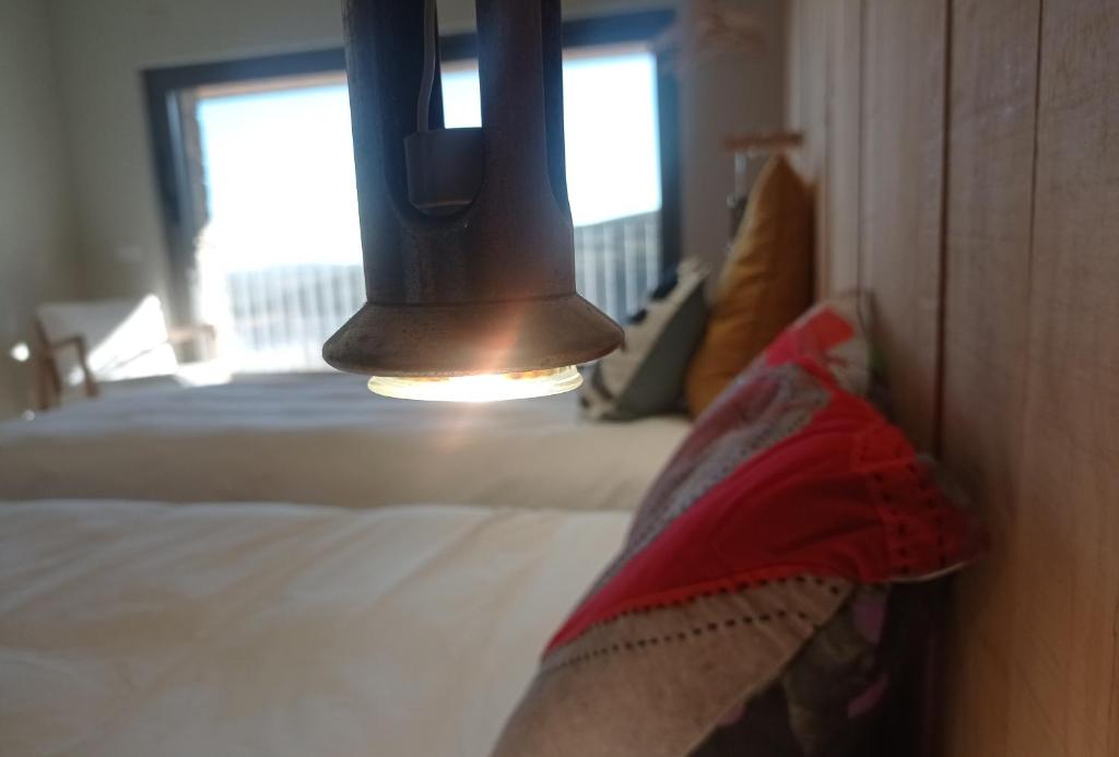 Postel nebo postele na pokoji v ubytování Balneario de Calabor