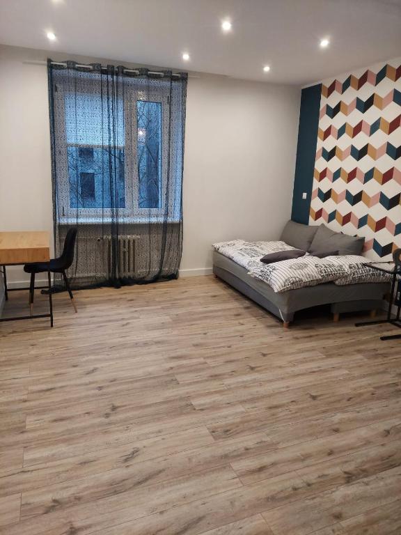 Posteľ alebo postele v izbe v ubytovaní Apartament Premium