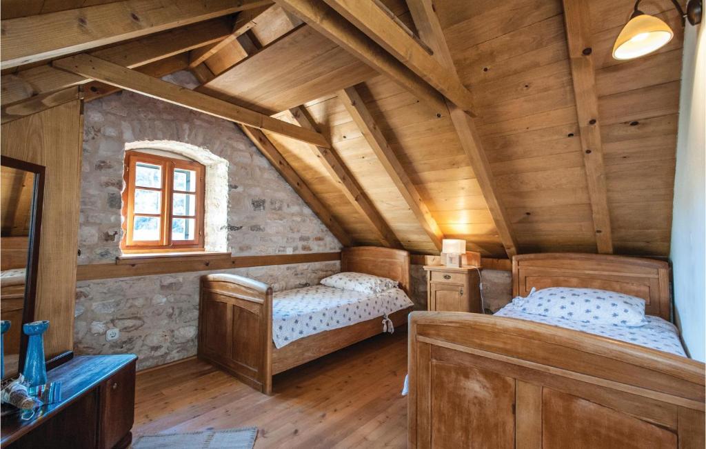 Posteľ alebo postele v izbe v ubytovaní Holiday Home With 2 Bedroom