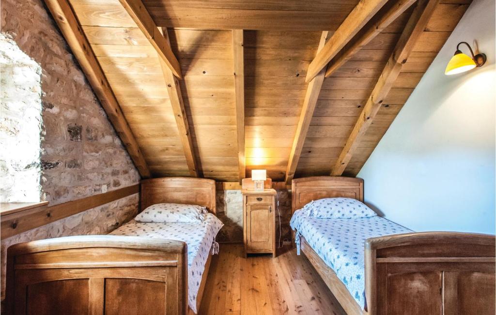 Posteľ alebo postele v izbe v ubytovaní Holiday Home With 2 Bedroom