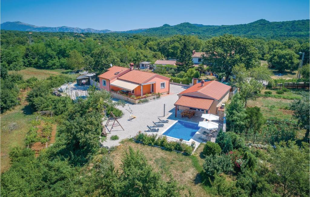 an aerial view of a house with a pool at 3 Bedroom Awesome Home In Labin in Labin