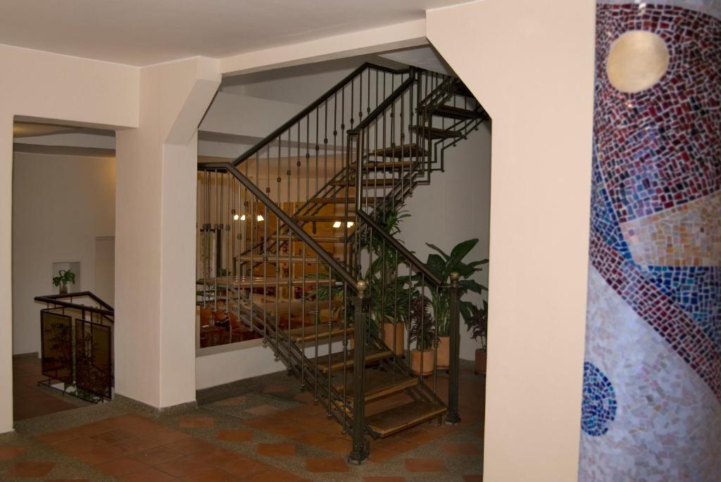 Postel nebo postele na pokoji v ubytování Hotel Casa Deco