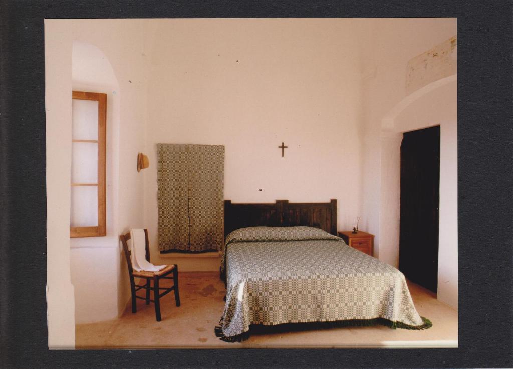 Postel nebo postele na pokoji v ubytování Terra di Leuca