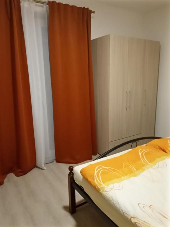 Postel nebo postele na pokoji v ubytování V centru