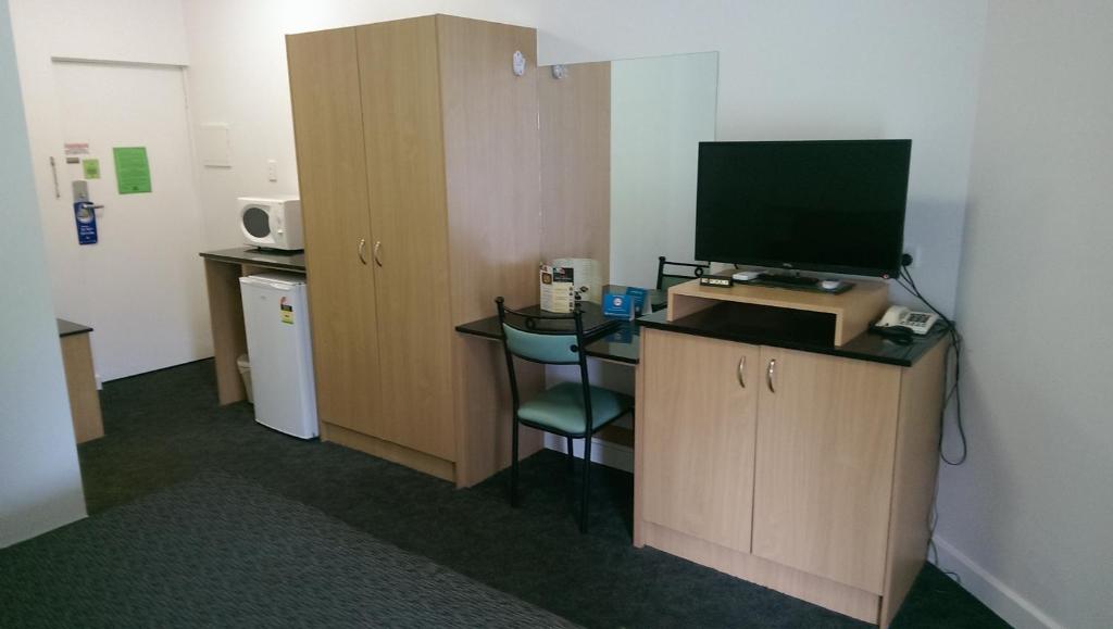 Kuchyň nebo kuchyňský kout v ubytování Baileys Parkside Motel by VetroBlu