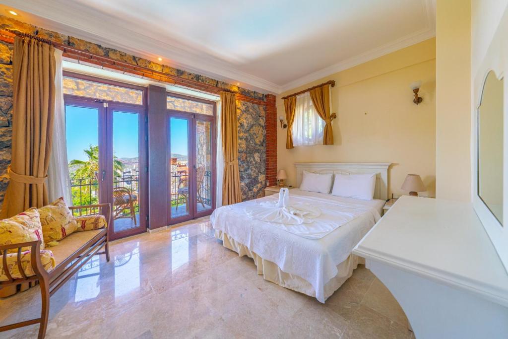 A bed or beds in a room at VILLA AYCHiN