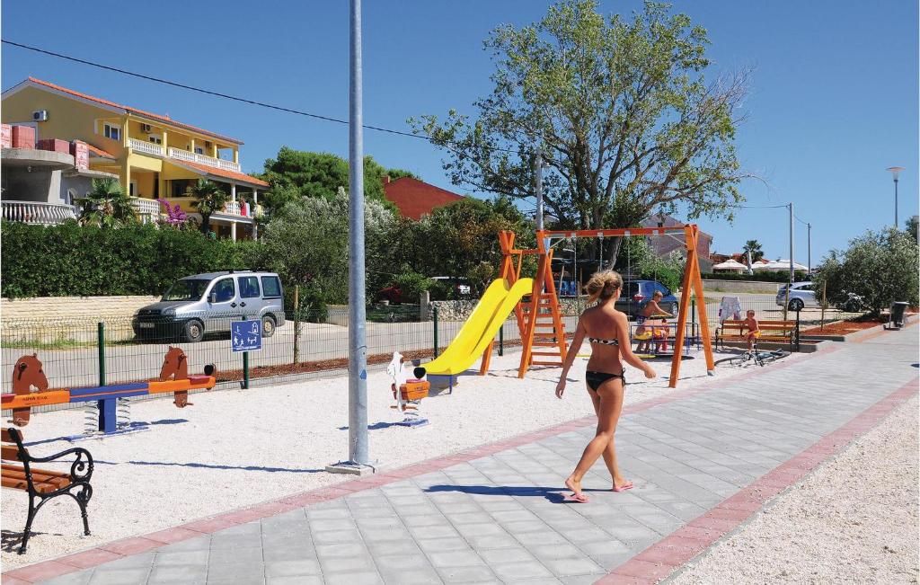 Detský kútik v ubytovaní Four-Bedroom Holiday Home In Vrsi