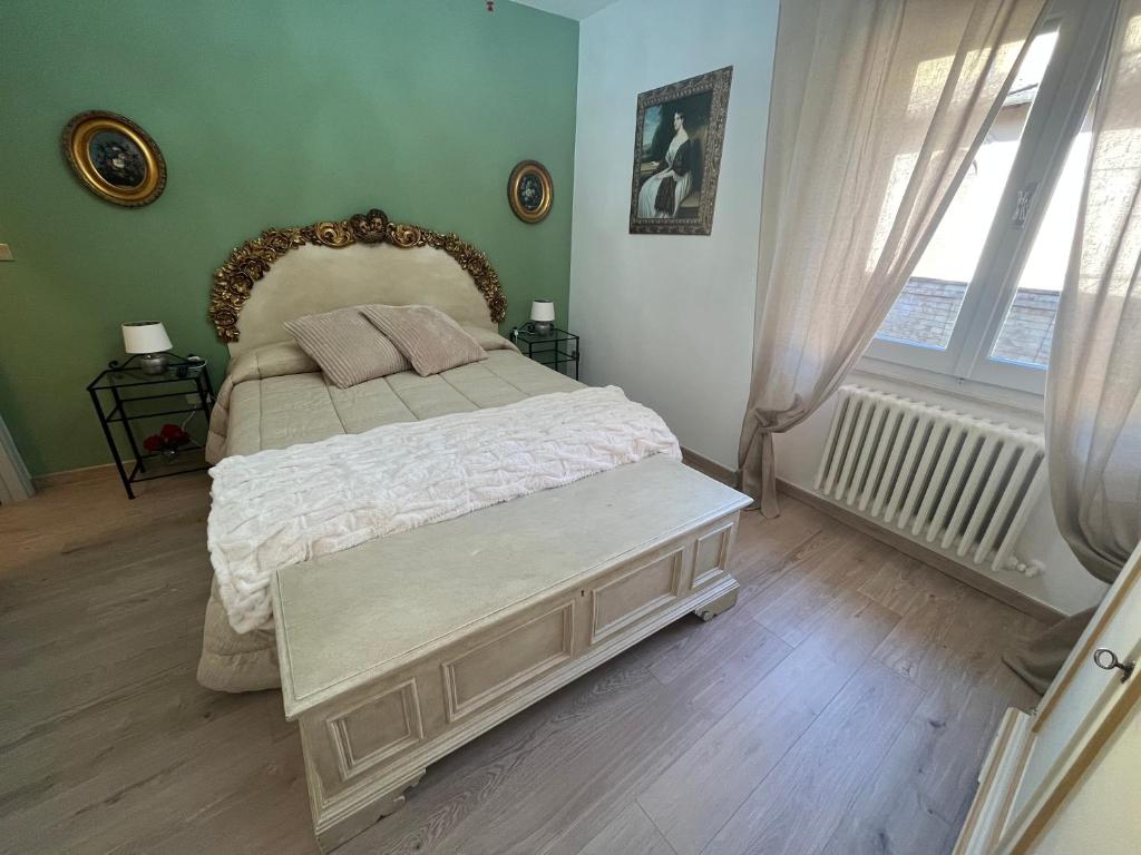 Posteľ alebo postele v izbe v ubytovaní Affittacamere Il Piccolo Borgo Foligno