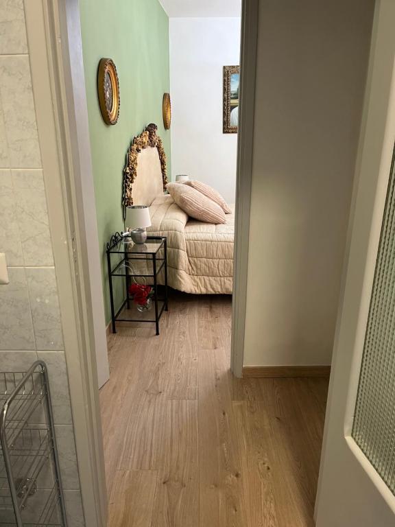 Posteľ alebo postele v izbe v ubytovaní Affittacamere Il Piccolo Borgo Foligno
