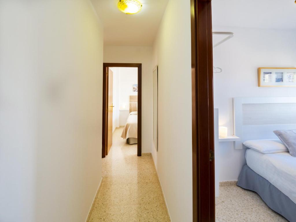 A bed or beds in a room at Cubo's La Terraza del Mar