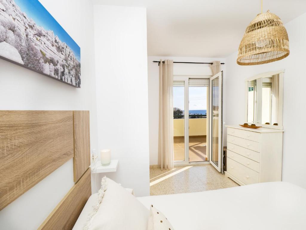A bed or beds in a room at Cubo's La Terraza del Mar