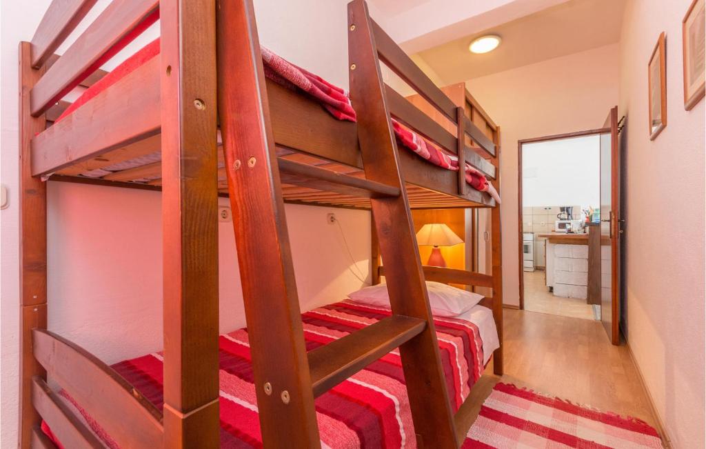 Postel nebo postele na pokoji v ubytování Holiday Home Mali Iz 40