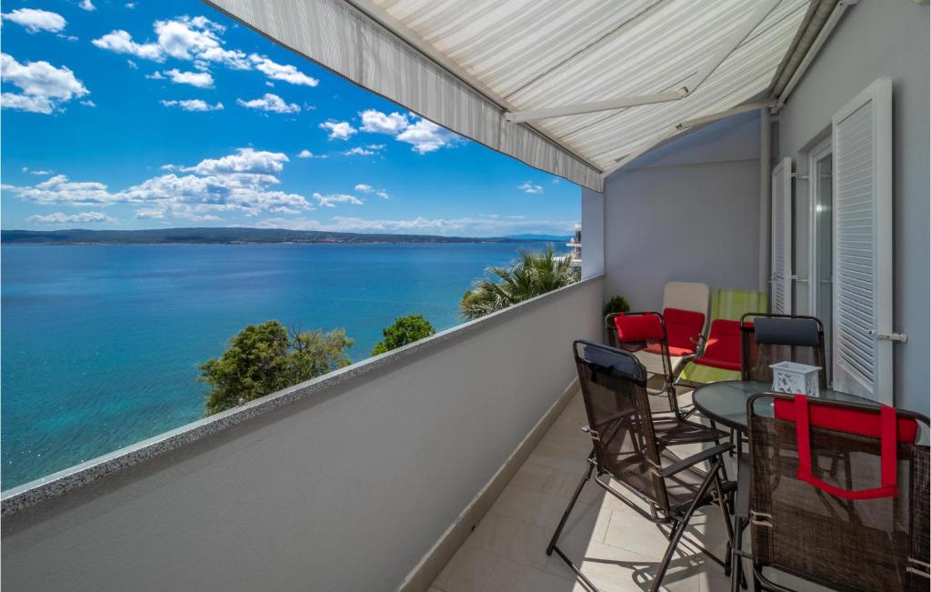 a balcony with a view of the water at Pet Friendly Apartment In Selce With House Sea View in Selce