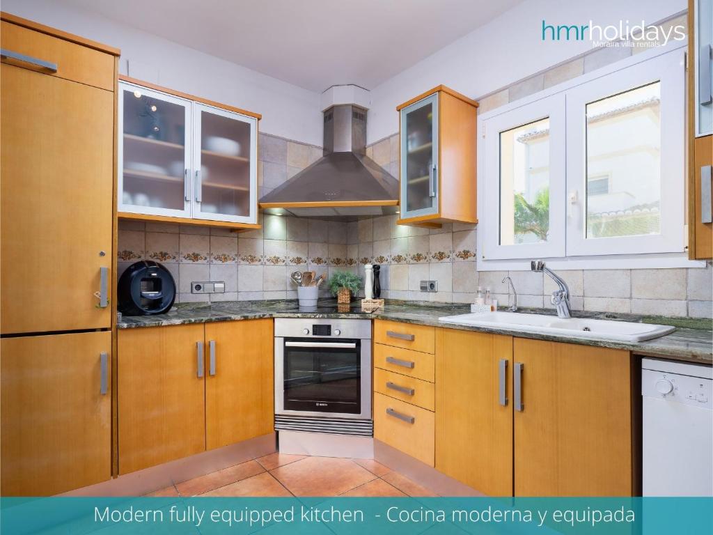 Kuchyň nebo kuchyňský kout v ubytování Villa Bella by HMR Holidays