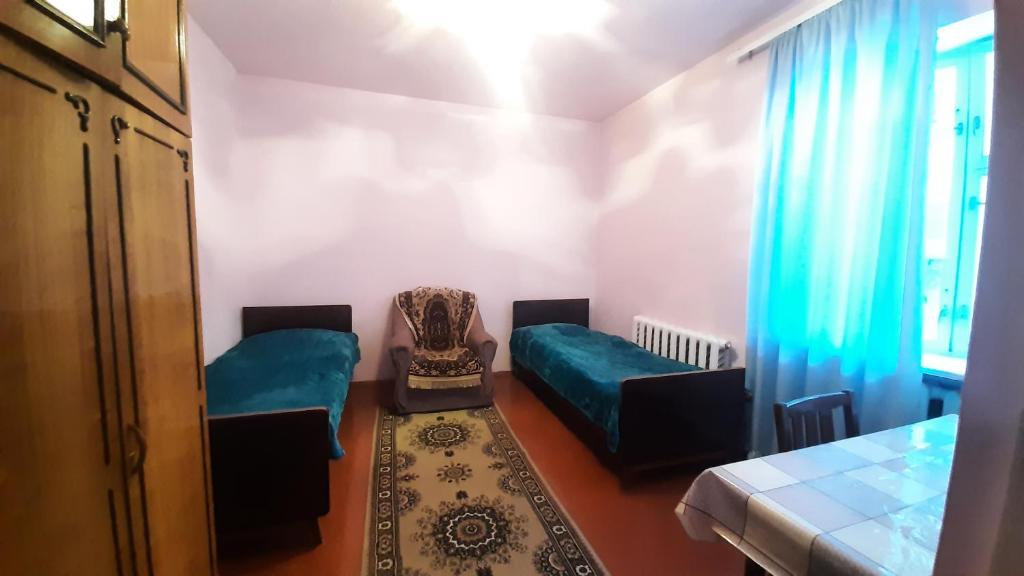 Postel nebo postele na pokoji v ubytování Ani Guest House