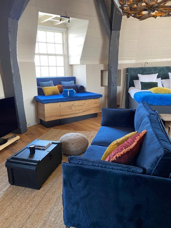 Posezení v ubytování Auberge de Campveerse Toren