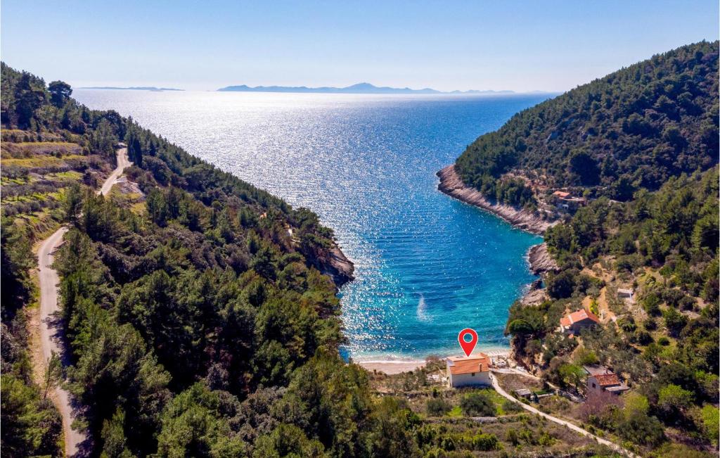 a view of the ocean from a hill at Beautiful Home In Pupnat With House Sea View in Pupnat