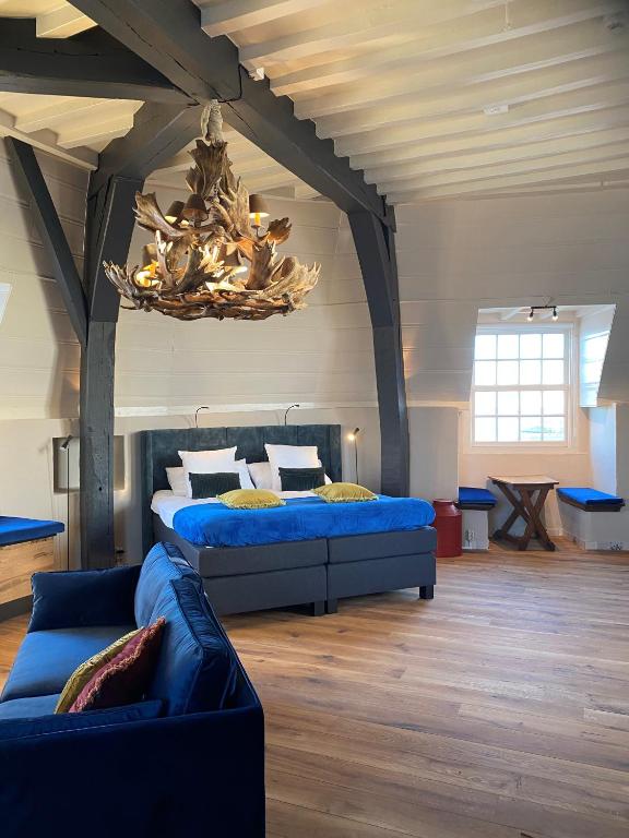 Postel nebo postele na pokoji v ubytování Auberge de Campveerse Toren