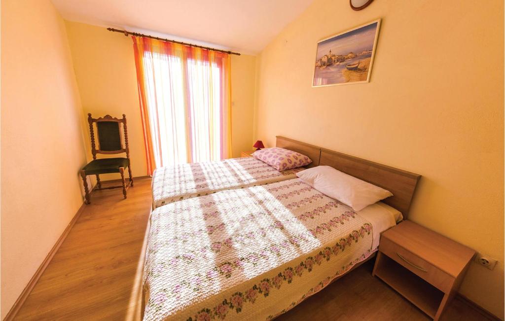 Posteľ alebo postele v izbe v ubytovaní Apartment Trogir Ul, F,tudmana