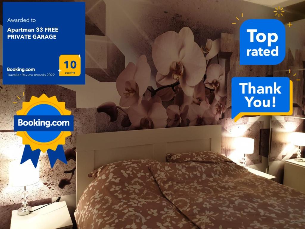 ein Schlafzimmer mit einem Bett und ein Schild, auf dem "Top Rated Danke" steht in der Unterkunft Apartman 33 FREE PRIVATE GARAGE in Novi Sad