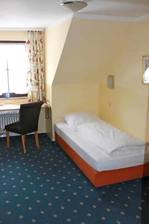 Postel nebo postele na pokoji v ubytování Arrivel am Bergson - bisher Hotel Neuner