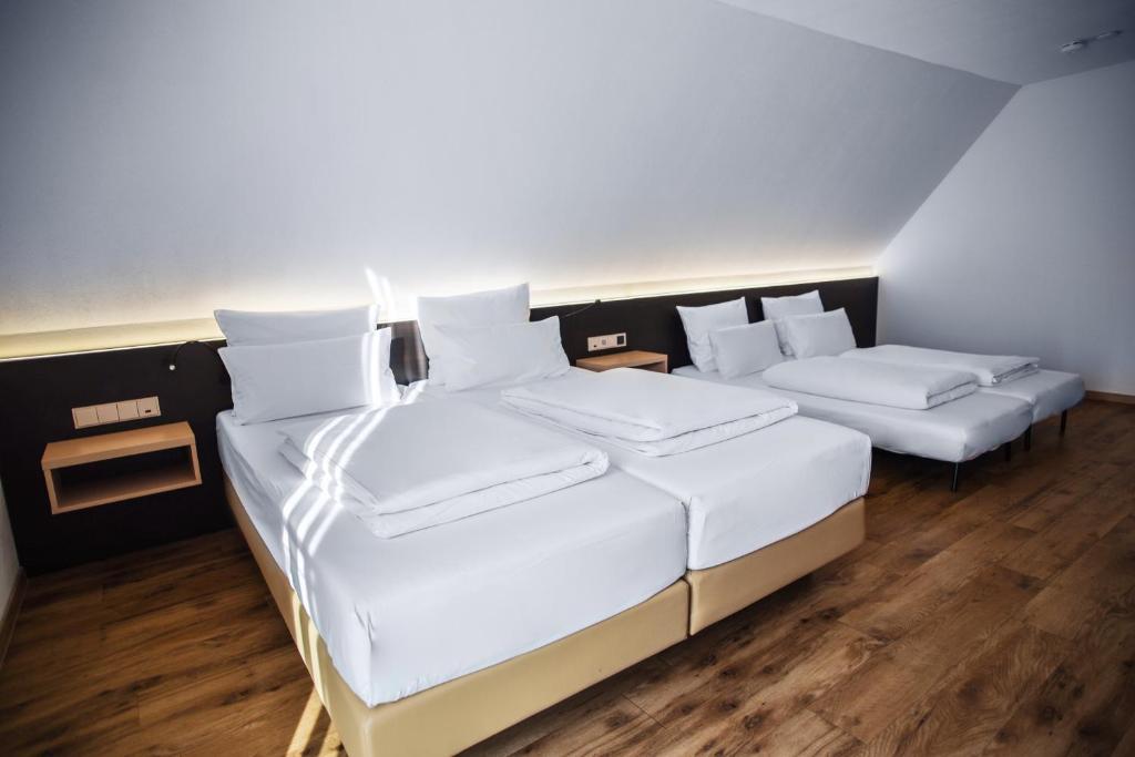 Katil atau katil-katil dalam bilik di Hotel U7