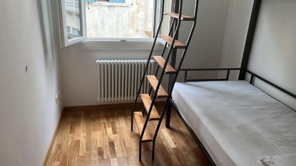Postel nebo postele na pokoji v ubytování FORESTERIA SOCIALE VENICE SAN MARCO by NEW GENERATION HOSTEL