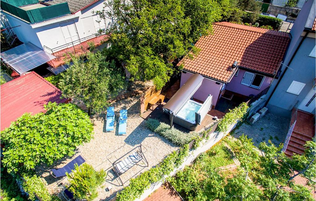 an overhead view of a house with a roof at Nice Home In Crikvenica With Kitchen in Selce
