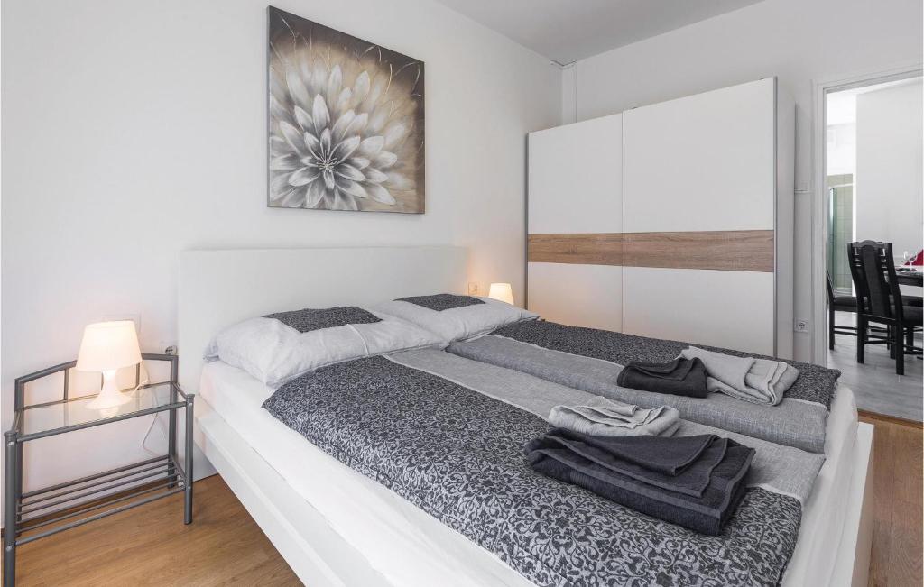 Postel nebo postele na pokoji v ubytování Apartment Korculanska Iii