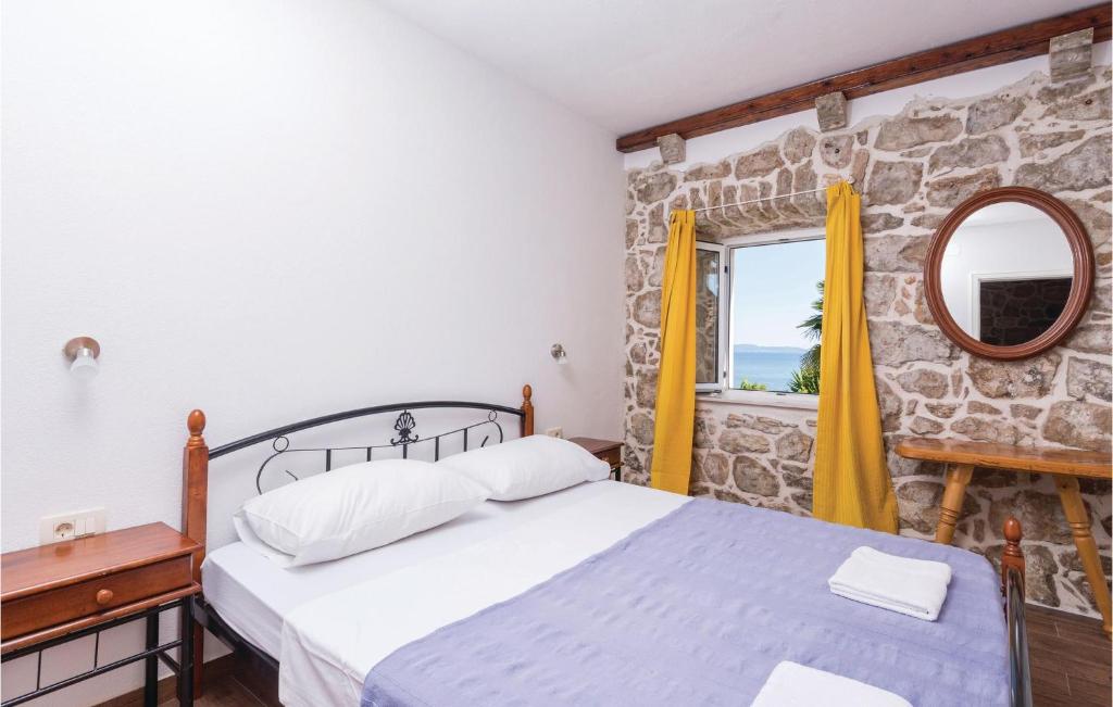 Postel nebo postele na pokoji v ubytování Four-Bedroom Holiday Home In Orebic