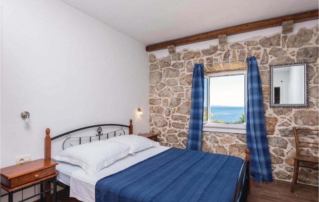 Postel nebo postele na pokoji v ubytování Four-Bedroom Holiday Home In Orebic