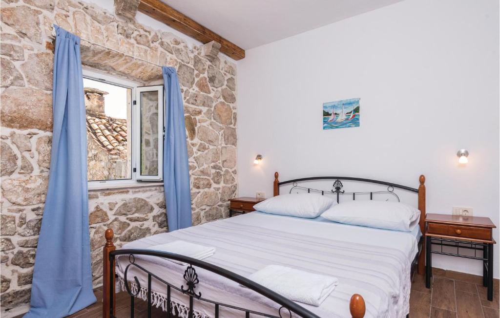Postel nebo postele na pokoji v ubytování Four-Bedroom Holiday Home In Orebic