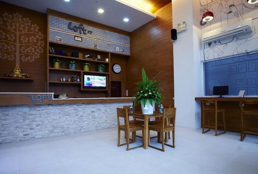 TV a/nebo společenská místnost v ubytování Loft 77