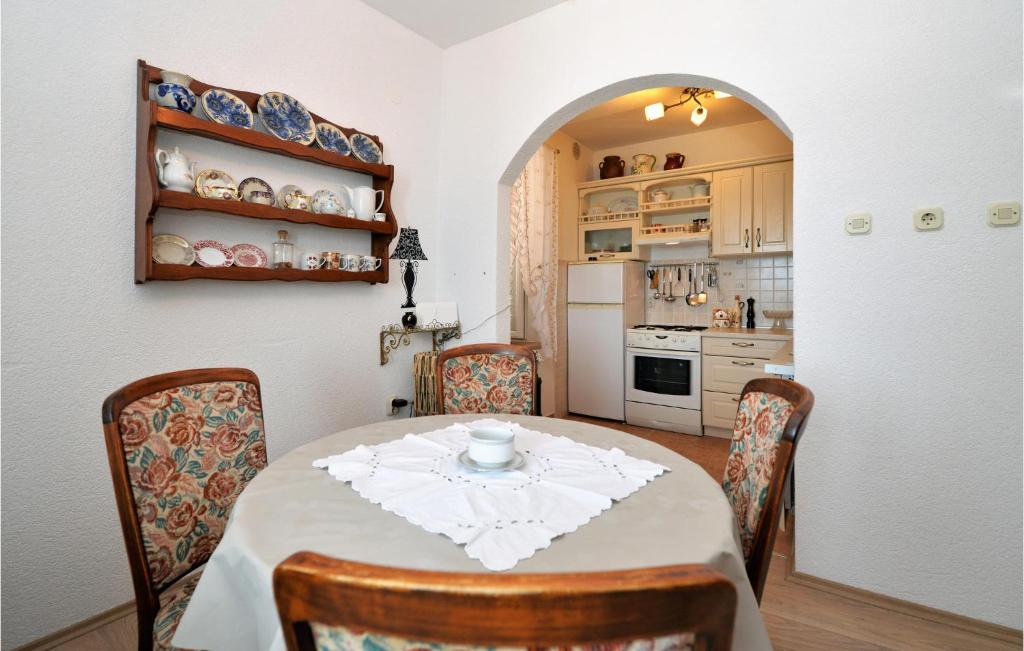 Kuchyň nebo kuchyňský kout v ubytování Apartment Stara Riva L-531