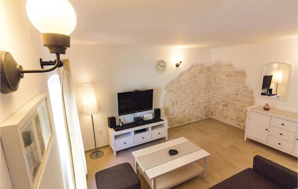 Telewizja i/lub zestaw kina domowego w obiekcie Holiday Home Medulin Ii