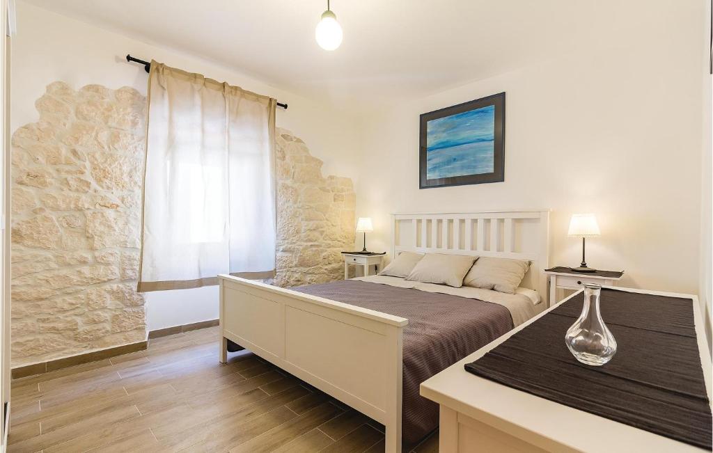 Łóżko lub łóżka w pokoju w obiekcie Holiday Home Medulin Ii