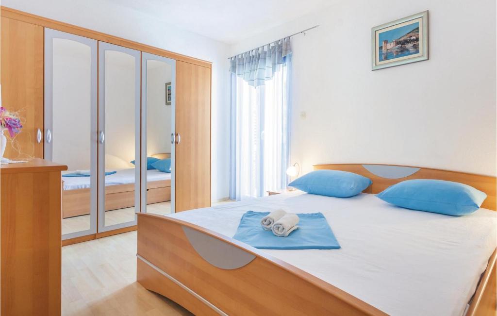 Posteľ alebo postele v izbe v ubytovaní Apartment Trogir Sv,lazara