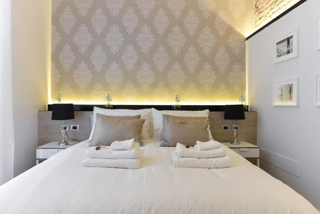 Łóżko lub łóżka w pokoju w obiekcie Luxury Home Vittoria