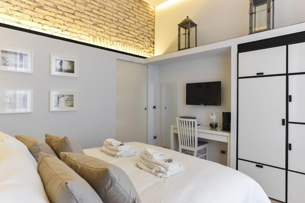 Łóżko lub łóżka w pokoju w obiekcie Luxury Home Vittoria