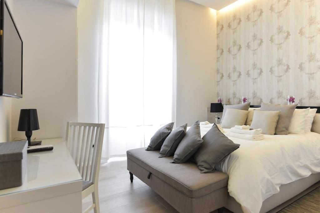 Łóżko lub łóżka w pokoju w obiekcie Luxury Home Vittoria