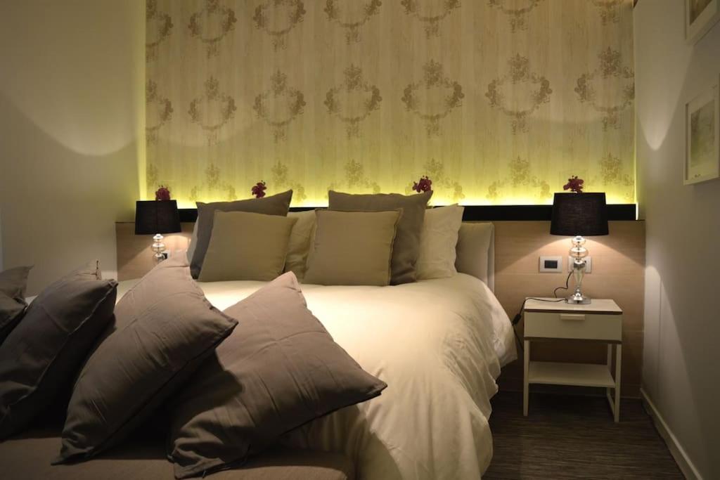 Łóżko lub łóżka w pokoju w obiekcie Luxury Home Vittoria