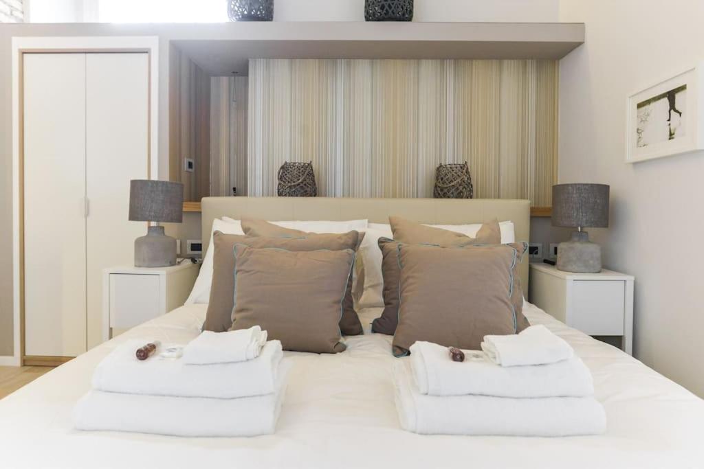 Łóżko lub łóżka w pokoju w obiekcie Luxury Home Vittoria