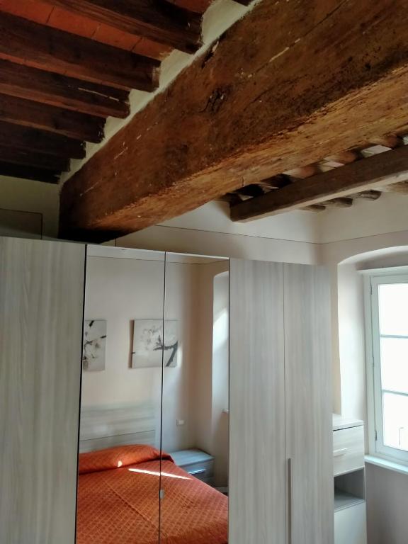 Postel nebo postele na pokoji v ubytování Casa Toscanella