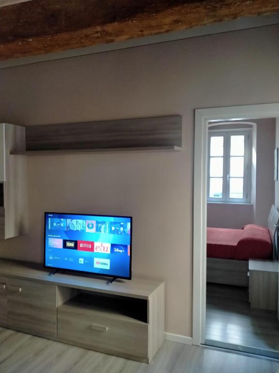 TV a/nebo společenská místnost v ubytování Casa Toscanella