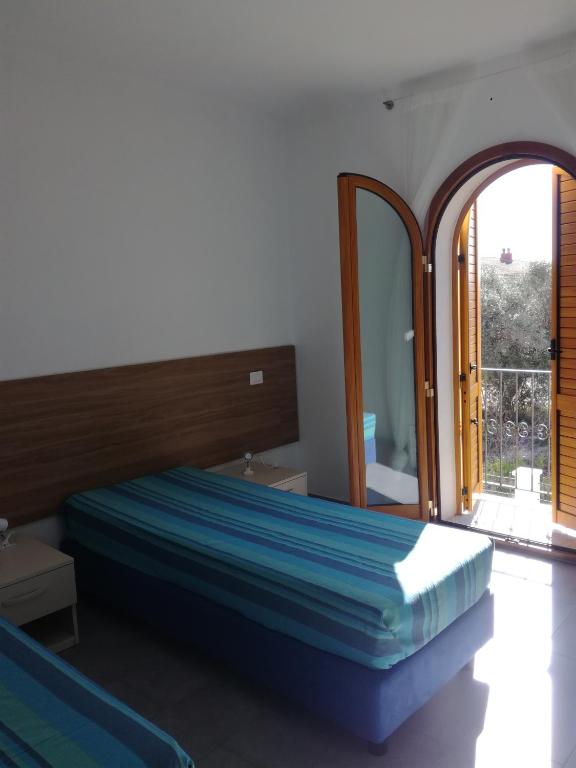 Letto o letti in una camera di Binja Fortuna