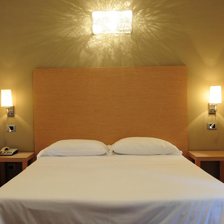Postel nebo postele na pokoji v ubytování Atlantic Park Hotel